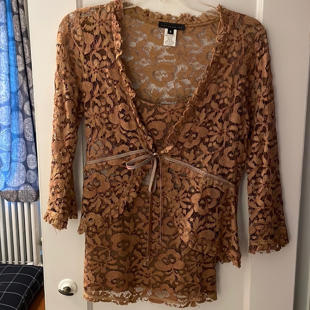 Beautiful for fall.  Burnt orange lace camisole with jacket that ties in front.